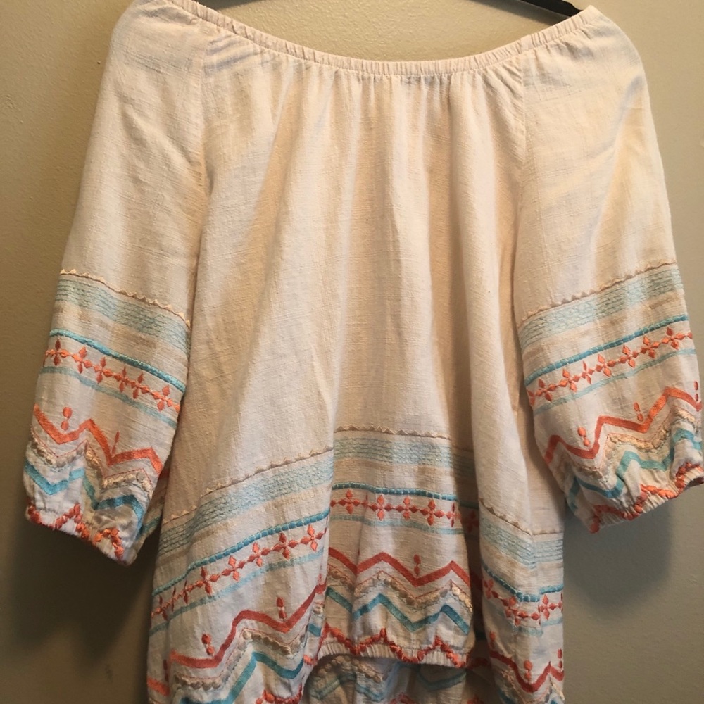 Cute festive blouse. Worn Off-the- shoulder or not